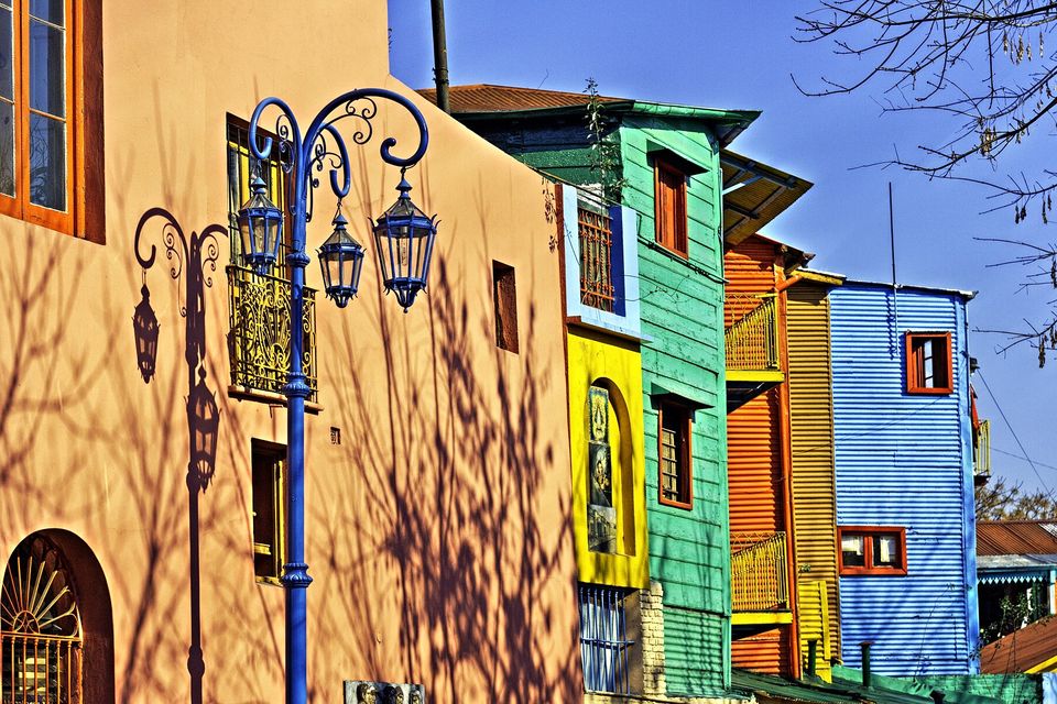 Colorful tin houses and street lamps in Caminito, La Boca