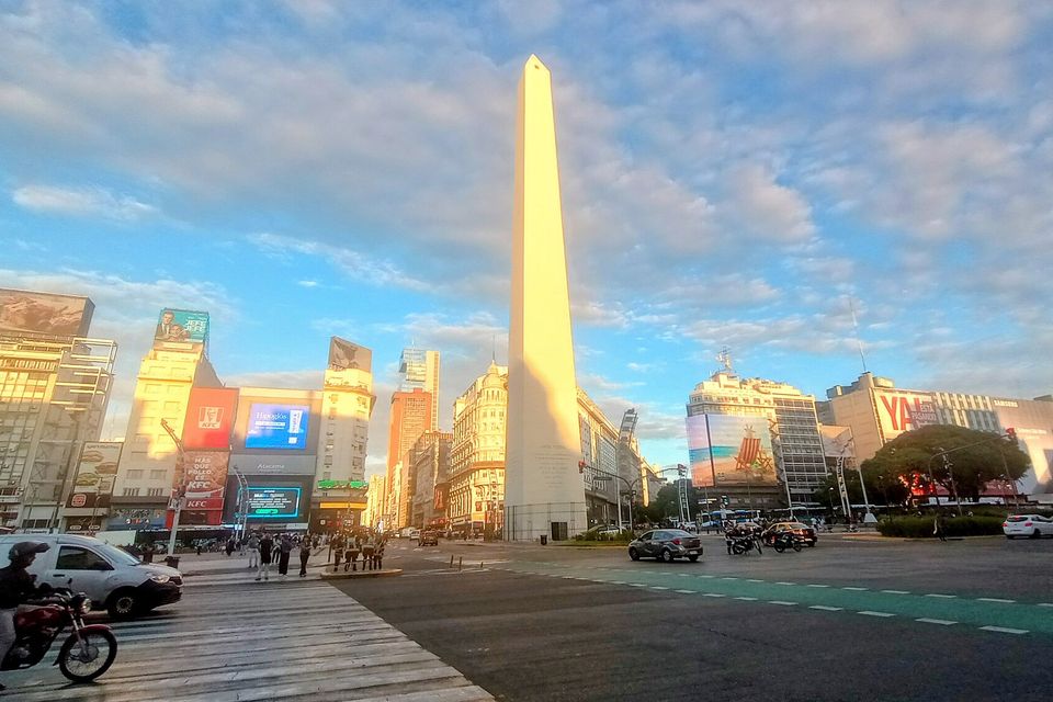 The Obelisk of Buenos Aires at sunset on 9 de Julio Avenue